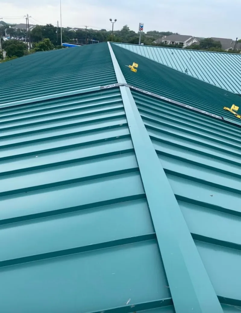 Green commercial metal roof ridge and valley for Metal Roof Repair in Sylvania